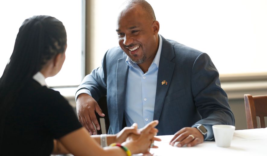 Mississippi Democratic U.S. Senate candidate Scott Colom speaks with Sen. Angela Alsobrooks, D-Md., before a campaign event at the Capital Club in Jackson, Miss., Saturday, Aug. 1, 2026. (AP Photo/Sarah Warnock)