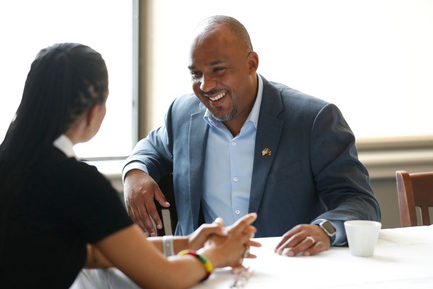 Mississippi Democratic U.S. Senate candidate Scott Colom speaks with Sen. Angela Alsobrooks, D-Md., before a campaign event at the Capital Club in Jackson, Miss., Saturday, Aug. 1, 2026. (AP Photo/Sarah Warnock)