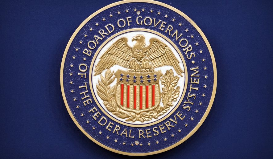 The logo of the Federal Reserve Board of Governors is seen before a news conference with Federal Reserve Board Chairman Kevin Warsh at the Federal Reserve in Washington, Wednesday, July 29, 2026. (AP Photo/Mark Schiefelbein)