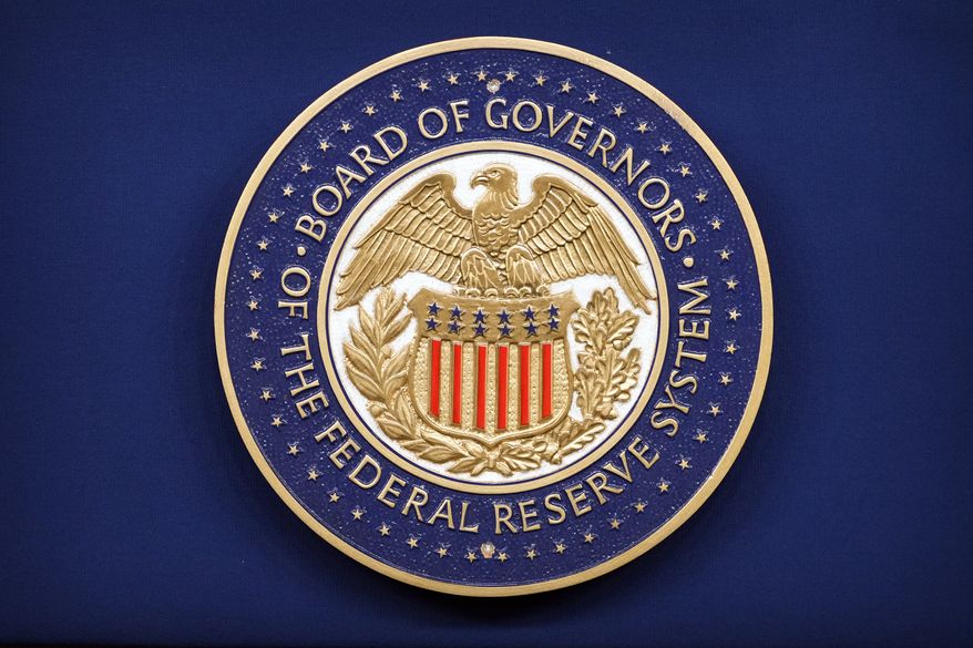 The logo of the Federal Reserve Board of Governors is seen before a news conference with Federal Reserve Board Chairman Kevin Warsh at the Federal Reserve in Washington, Wednesday, July 29, 2026. (AP Photo/Mark Schiefelbein)