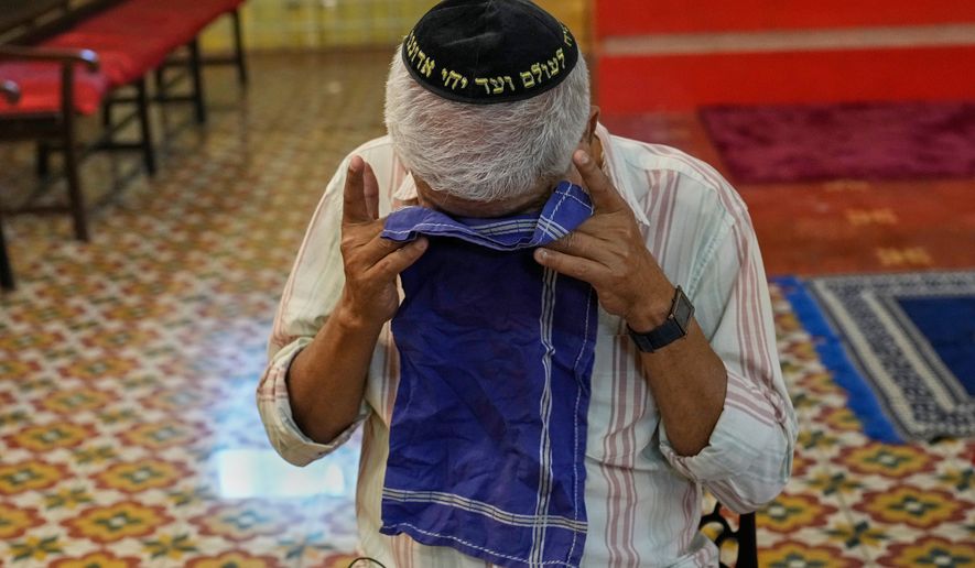 Elias Josephai, a Malabari Jew, wipes away tears while speaking to The Associated Press at the 12th-century Kadavumbagam Synagogue in Ernakulam, mainland district of Kochi, India, Thursday, May 21, 2026. (AP Photo/Aijaz Rahi)