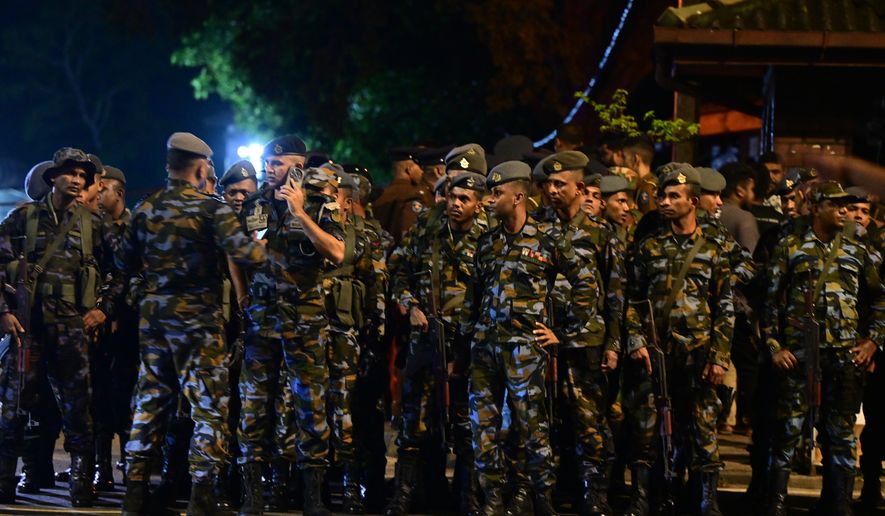 Sri Lankan soldiers stand outside the Magazine Prison following an unrest in Colombo, Sri Lanka, Thursday, Aug. 6, 2026. (AP Photo)