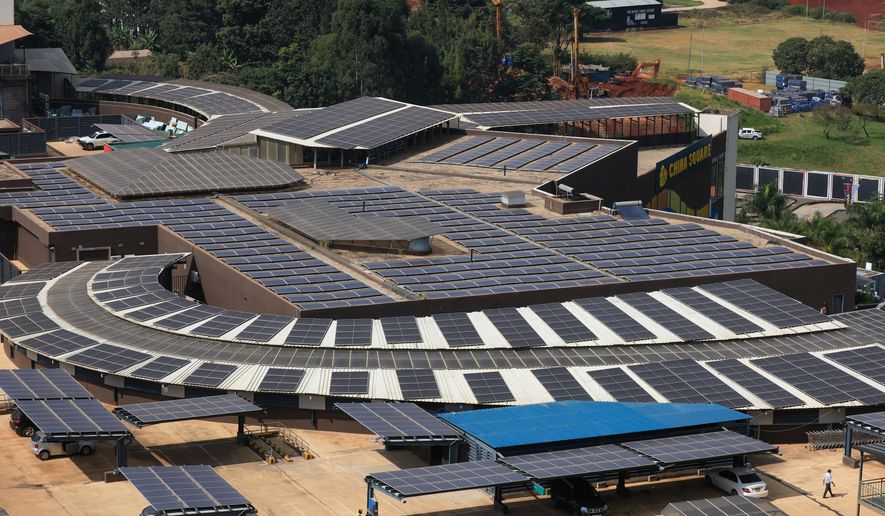 A solar power plant is seen at the car park of Two Rivers Complex in Nairobi, Kenya, July 16, 2026. (AP Photo/Andrew Kasuku, File)