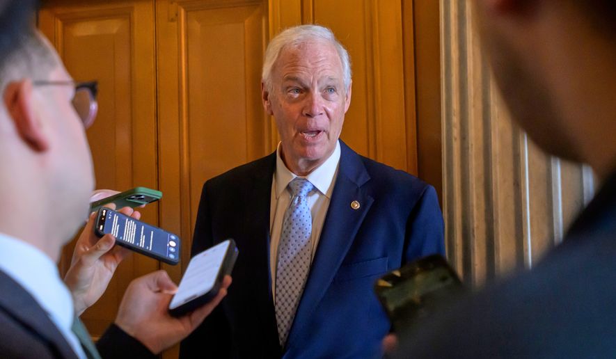 Sen. Ron Johnson, R-Wis., talks with reporters outside of the Senate chamber during a vote at the U.S. Capitol, Friday, August 7, 2026, in Washington. (AP Photo/Rod Lamkey, Jr.)