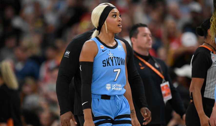 Chicago Sky's DiJonai Carrington walks off the court ejected from the game for committing a flagrant foul against Indiana Fever's Sophie Cunningham during the first half of an WNBA basketball game in Chicago, Saturday, Aug. 8, 2026. (AP Photo/Paul Beaty)