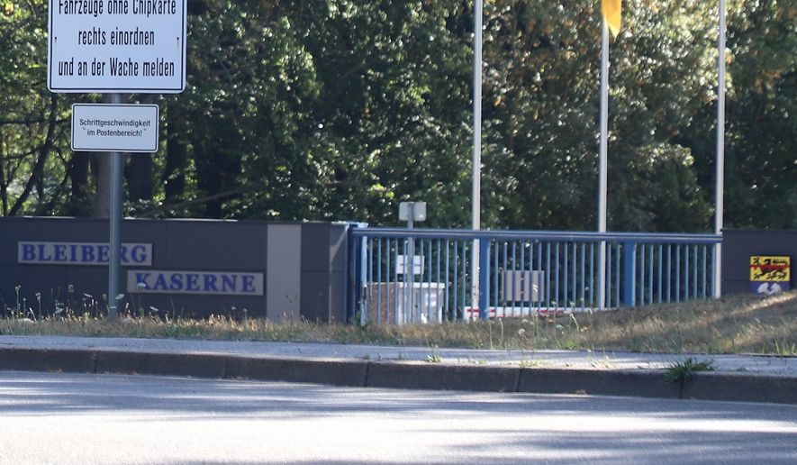 A view of the entrance to the Bleiberg Barracks, in Mechernich, Germany. Around 10:00 p.m. on Thursday evening, the security center at the Bundeswehr base in Mechernich reported that two drones had been spotted over the property, a spokeswoman for the Bundeswehr's Operational Command confirmed upon inquiry. (Fotoreport-DB/dpa via AP)