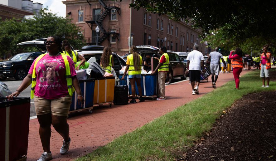 Howard University students move in ahead of the 2026-2027 school year, Thursday, Aug. 6, 2026, in Washington. (AP Photo/Allison Robbert)