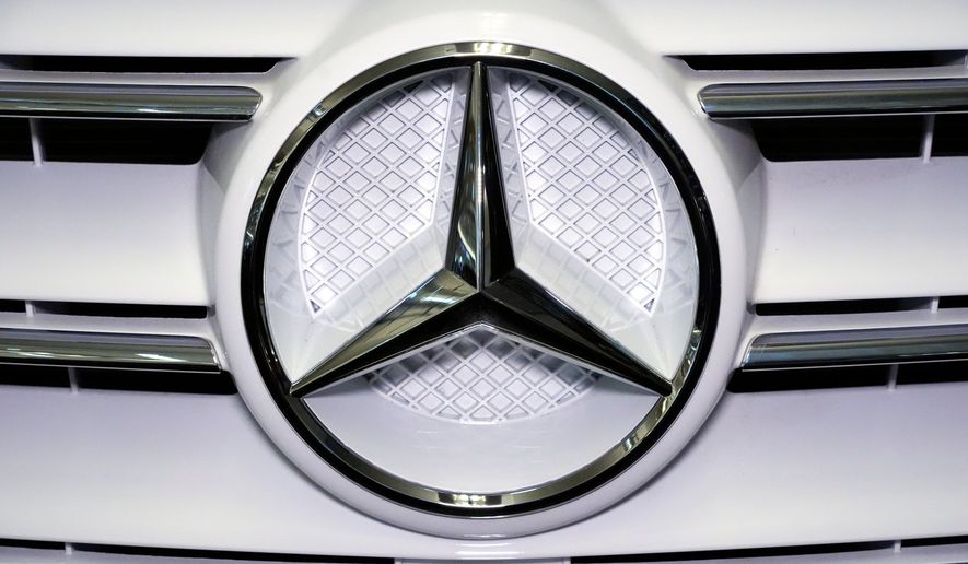 A Mercedes Benz logo is displayed on a vehicle at the Pittsburgh International Auto Show in Pittsburgh, Feb. 14, 2025. (AP Photo/Gene J. Puskar, File)