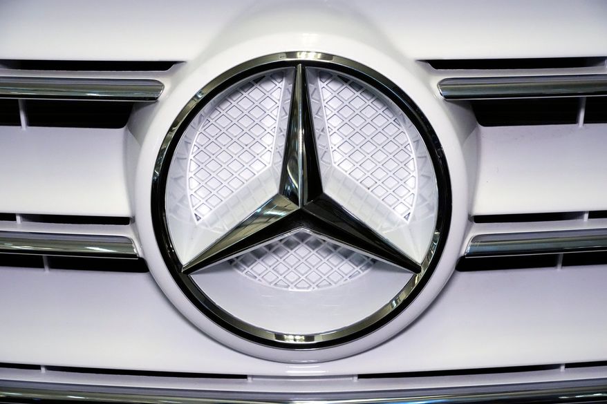 A Mercedes Benz logo is displayed on a vehicle at the Pittsburgh International Auto Show in Pittsburgh, Feb. 14, 2025. (AP Photo/Gene J. Puskar, File)