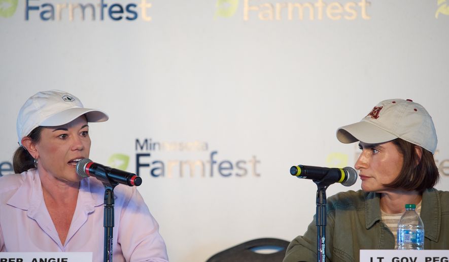 U.S. Rep. Angie Craig, D-Minn., left, and Minnesota Lt. Gov. Peggy Flanagan participate in a forum for U.S. Senate candidates at Farmfest Wednesday, Aug. 5, 2026, in Morgan, Minn. (AP Photo/Ellen Schmidt)