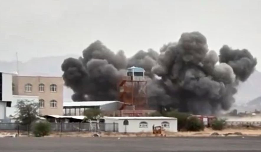 FILE - This image taken from video broadcast by Al-Masirah TV, a Houthi-controlled news channel, shows an explosion at the Sanaa International Airport compound during what the Iranian-backed Houthi rebels in Yemen said were several Saudi airstrikes in Sanaa, Yemen, July 13, 2026. (Al-Masirah TV via AP, File)