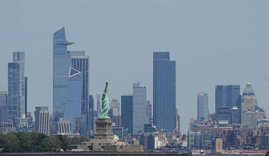 FILE - The New York skyline and Statue of Liberty are seen on May 12, 2025. (AP Photo/Matt Rourke, File)