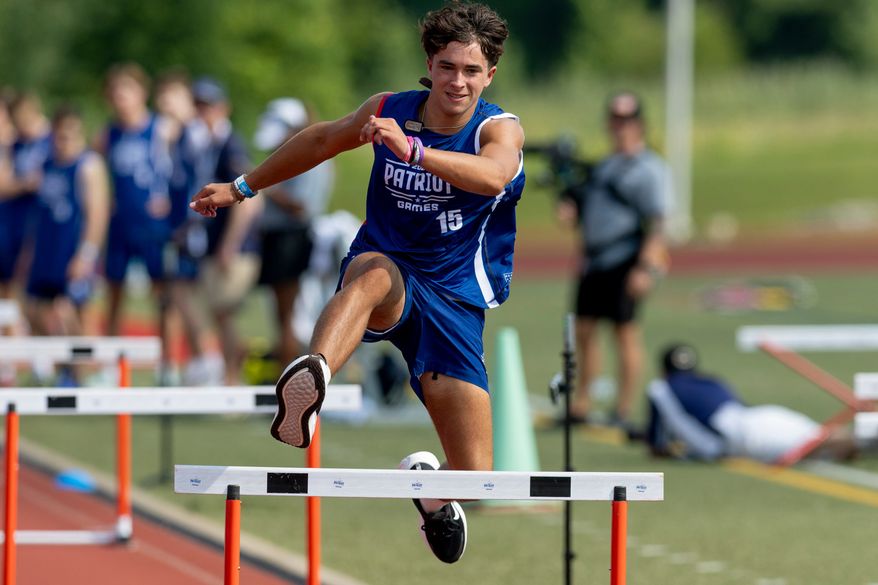 Tyler Gorrell of Indiana participates in the 55 meter hurdles during day one of the Patriot Games, Sunday, Aug. 9, 2026, in Geneva, Ohio. (AP Photo/Nate Manley)