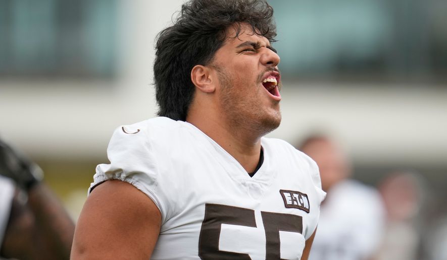 Cleveland Browns' Spencer Fano shouts during an NFL football training camp, Saturday, Aug. 1, 2026, in Berea, Ohio. (AP Photo/Sue Ogrocki)