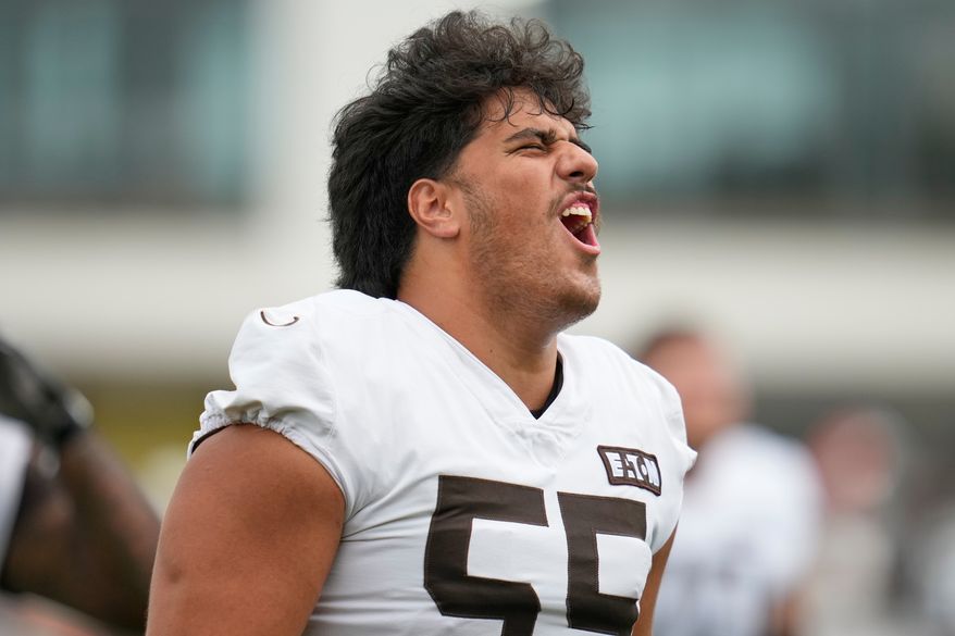 Cleveland Browns' Spencer Fano shouts during an NFL football training camp, Saturday, Aug. 1, 2026, in Berea, Ohio. (AP Photo/Sue Ogrocki)