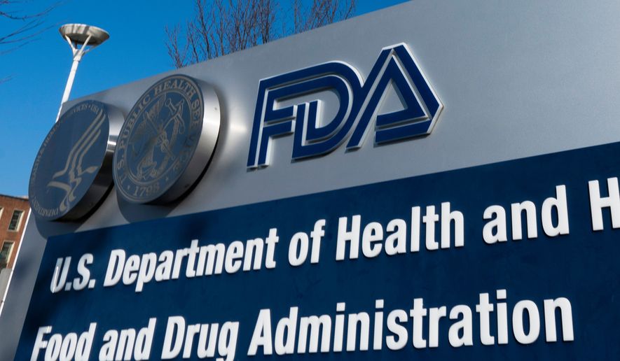 A sign for the U.S. Food and Drug Administration is displayed outside their offices in Silver Spring, Md., Dec. 10, 2020. (AP Photo/Manuel Balce Ceneta, File)