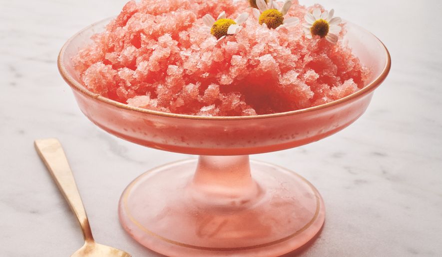This image released by Voracious shows a recipe for watermelon granita from the cookbook "I Love You" by Pamela Anderson. (Ditte Isager/Voracious via AP)