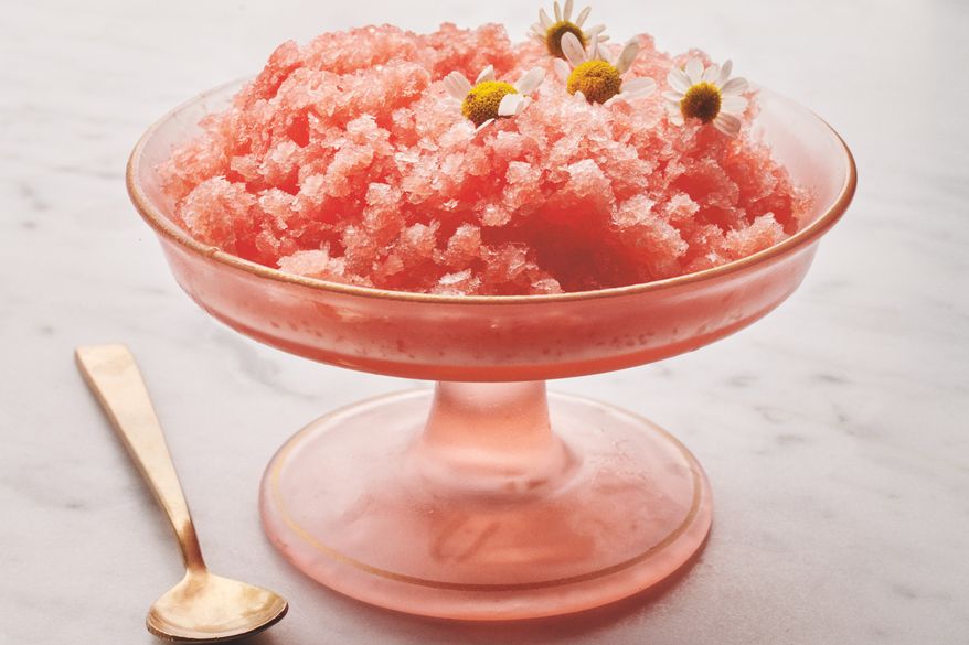 This image released by Voracious shows a recipe for watermelon granita from the cookbook "I Love You" by Pamela Anderson. (Ditte Isager/Voracious via AP)