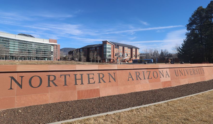 FILE - A sign is displayed for the Northern Arizona University campus in Flagstaff, Ariz., Feb. 2, 2026. (AP Photo/Cheyanne Mumphrey, File)