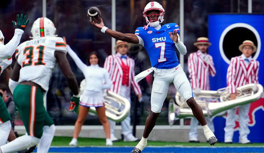 FILE - SMU quarterback Kevin Jennings throws a pass during an NCAA college football game against Miami, Nov. 1, 2025, in Dallas. (AP Photo/Jeffrey McWhorter, File)