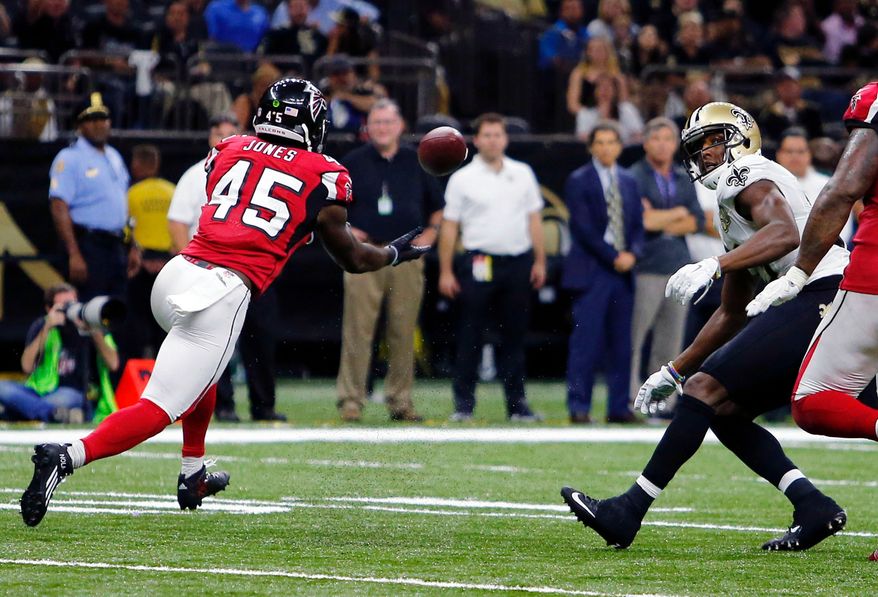 FILE - Atlanta Falcons outside linebacker Deion Jones (45) intercepts a pass from New Orleans Saints quarterback Drew Brees, not pictured, and returns it for a touchdown, in the second half of an NFL football game in New Orleans, on Sept. 26, 2016. (AP Photo/Butch Dill, File)