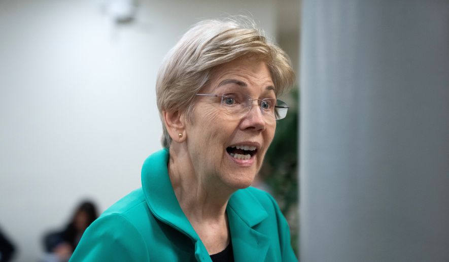 Sen. Elizabeth Warren, D-Mass., walks through the U.S. Capitol during votes in Washington, Thursday, July 16, 2026. (AP Photo/Allison Robbert) ** FILE **