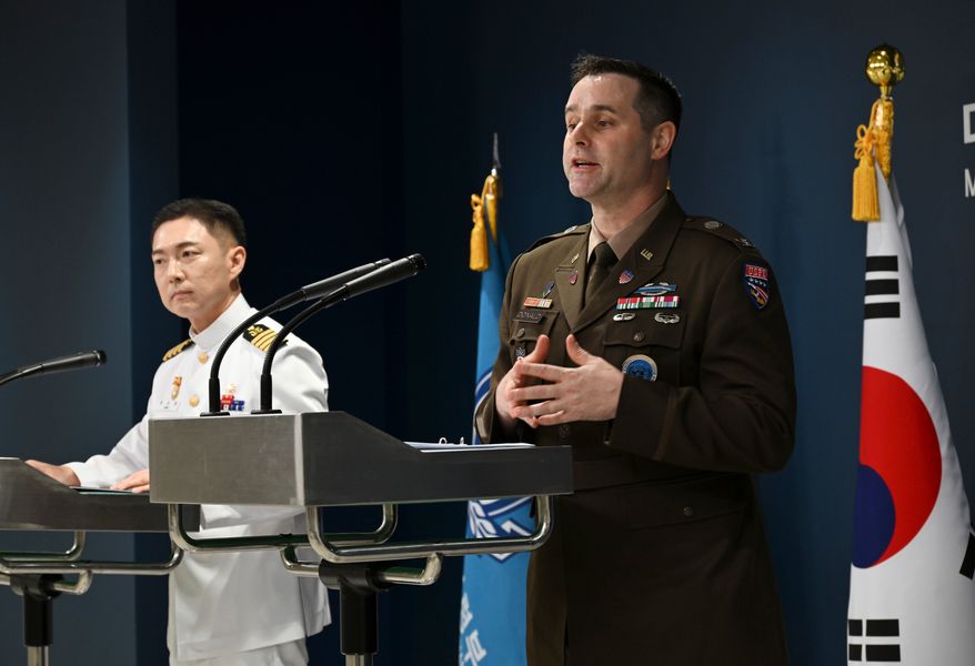 Col. Jang Do-young, left, public affairs director of South Korea's Joint Chiefs of Staff, and Col. Ryan Donaldson, public affairs director of the United Nations Command, Combined Forces Command and United States Forces Korea, attend a press briefing for the Ulchi Freedom Shield 2026 exercise at the Defense Ministry in Seoul, South Korea, on Monday, Aug. 10, 2026. (Song Kyung-Seok/Pool Photo via AP)