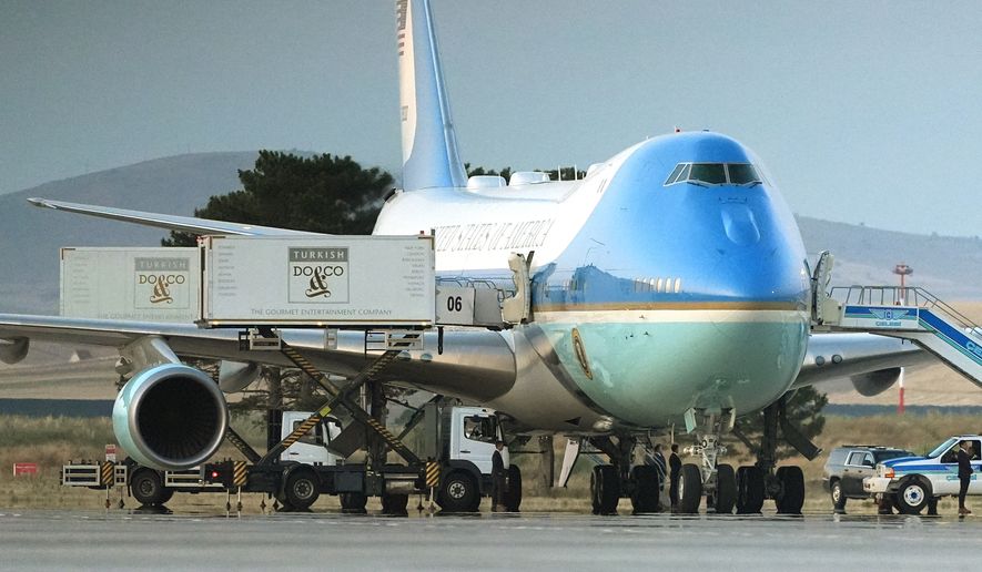 Catering trucks are parked at Air Force One on the tarmac as the motorcade carrying U.S. President Donald Trump arrives on the tarmac to depart following the NATO summit at Ankara International Airport in Ankara, Turkey, Wednesday, July 8, 2026. (AP Photo/Alex Brandon)