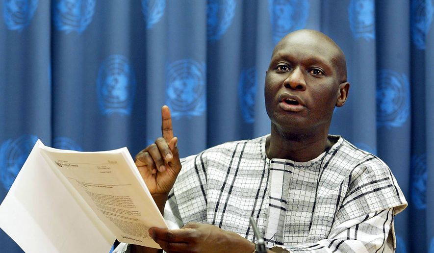 Olara Otunnu, the United Nations special representative for children and armed conflict, briefs reporters on Dec. 16, 2002, at the United Nations. (AP Photo/David Karp, File)