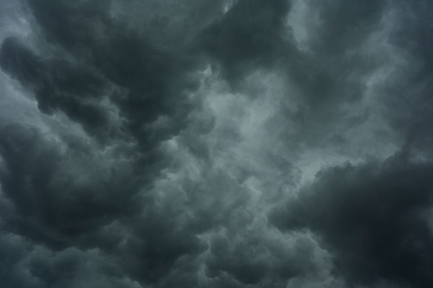 Storm clouds are seen over the Cincinnati Bengals NFL football practice in Cincinnati, Tuesday, Aug. 11, 2026. (AP Photo/Carolyn Kaster)