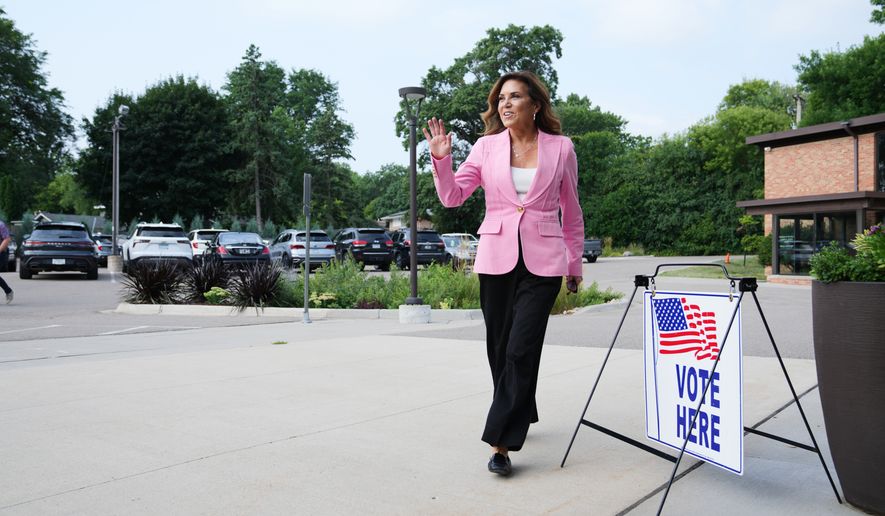 Michele Tafoya, a Republican candidate for U.S. Senate, arrives to vote on Tuesday, Aug. 11, 2026, in Minneapolis. (AP Photo/Ellen Schmidt)