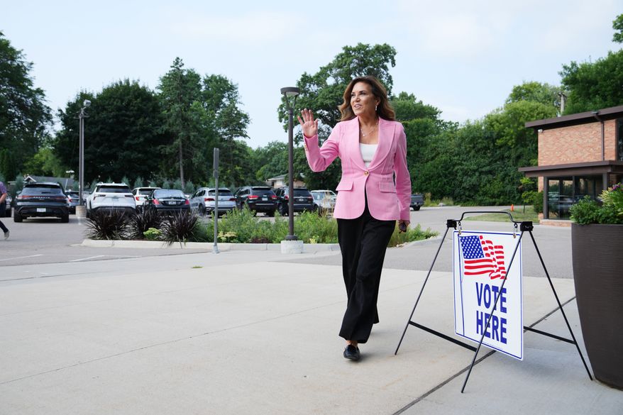 Michele Tafoya, a Republican candidate for U.S. Senate, arrives to vote on Tuesday, Aug. 11, 2026, in Minneapolis. (AP Photo/Ellen Schmidt)