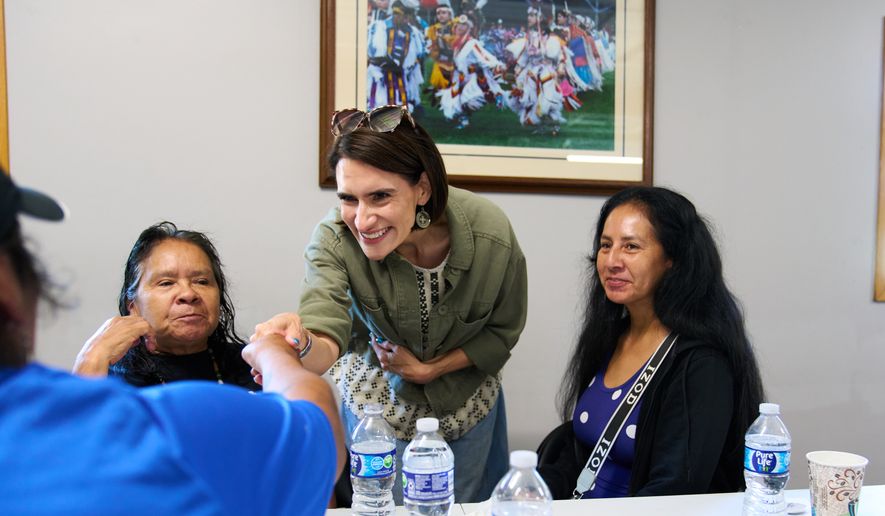 Minnesota Lt. Gov. Peggy Flanagan, a Democratic candidate for U.S. Senate, greets supporters during a campaign event at the Leech Lake Band of Ojibwe Twin Cities Office in Minneapolis, Saturday, Aug. 8, 2026. (AP Photo/Ellen Schmidt)