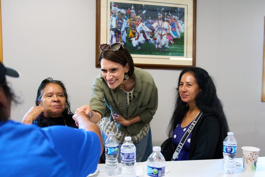 Minnesota Lt. Gov. Peggy Flanagan, a Democratic candidate for U.S. Senate, greets supporters during a campaign event at the Leech Lake Band of Ojibwe Twin Cities Office in Minneapolis, Saturday, Aug. 8, 2026. (AP Photo/Ellen Schmidt)