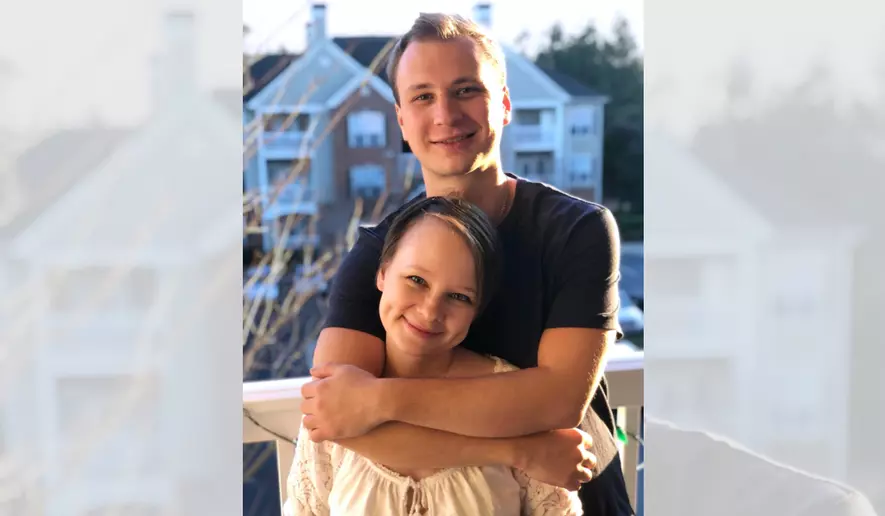 This photo provided by the family shows Robert Gilman and his sister, Lexie Hudson, in Lilburn, Ga., in 2019. (Gilman family via AP)