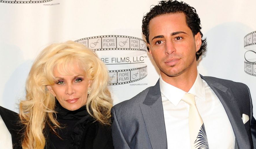 FILE - Victoria Gotti and her son, Carmine Agnello attend a news conference for the film "Gotti: Three Generations," on April 12, 2011, in New York. (AP Photo/Evan Agostini, File)