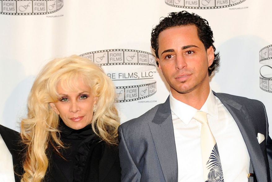 FILE - Victoria Gotti and her son, Carmine Agnello attend a news conference for the film "Gotti: Three Generations," on April 12, 2011, in New York. (AP Photo/Evan Agostini, File)