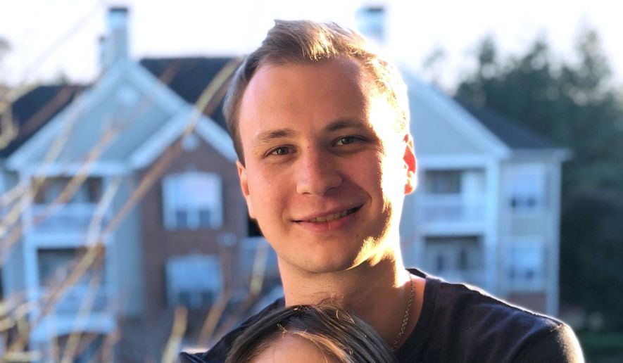 This photo provided by the family shows Robert Gilman and his sister, Lexie Hudson, in Lilburn, Ga., in 2019. (Gilman family via AP)