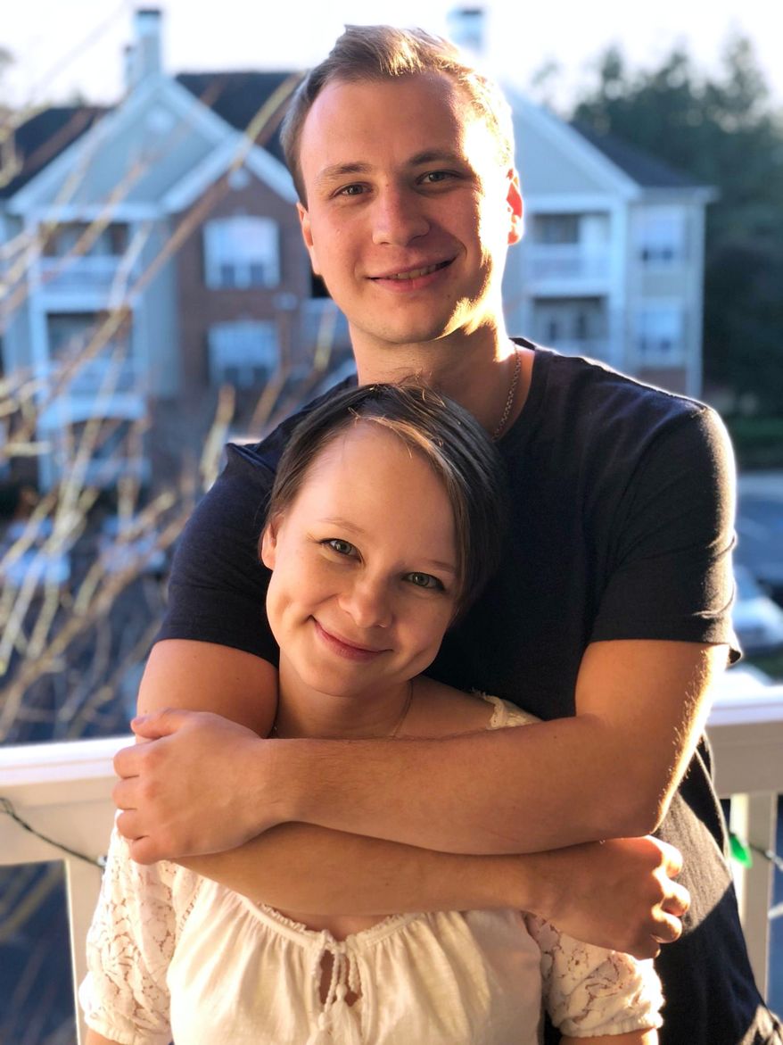 This photo provided by the family shows Robert Gilman and his sister, Lexie Hudson, in Lilburn, Ga., in 2019. (Gilman family via AP)