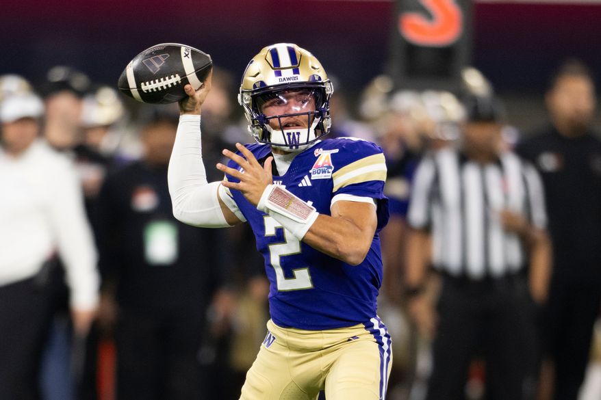 FILE - Washington quarterback Demond Williams Jr. throws a pass during the LA Bowl NCAA college football game against Boise State, Dec. 13, 2025, in Inglewood, Calif. (AP Photo/Kyusung Gong, File)