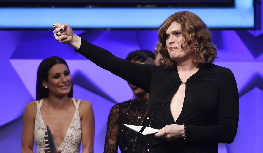 Lilly Wachowski, a writer and director of the Netflix series "Sense8," accepts the Outstanding Drama Series Award for the show during the 27th Annual GLAAD Media Awards at the Beverly Hilton on Saturday, April 2, 2016, in Beverly Hills, Calif. The show marked Wachowski's first public appearance since announcing her gender transition to female. (Photo by Chris Pizzello/Invision/AP)