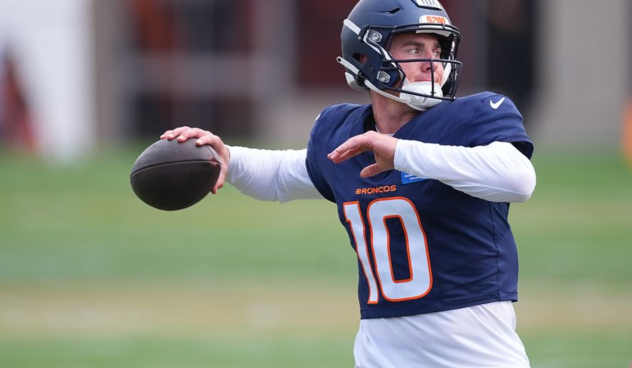 Denver Broncos quarterback Bo Nix takes part in drills during a practice at the team's NFL football training camp Monday, Aug. 10, 2026, in Centennial, Colo. (AP Photo/David Zalubowski)