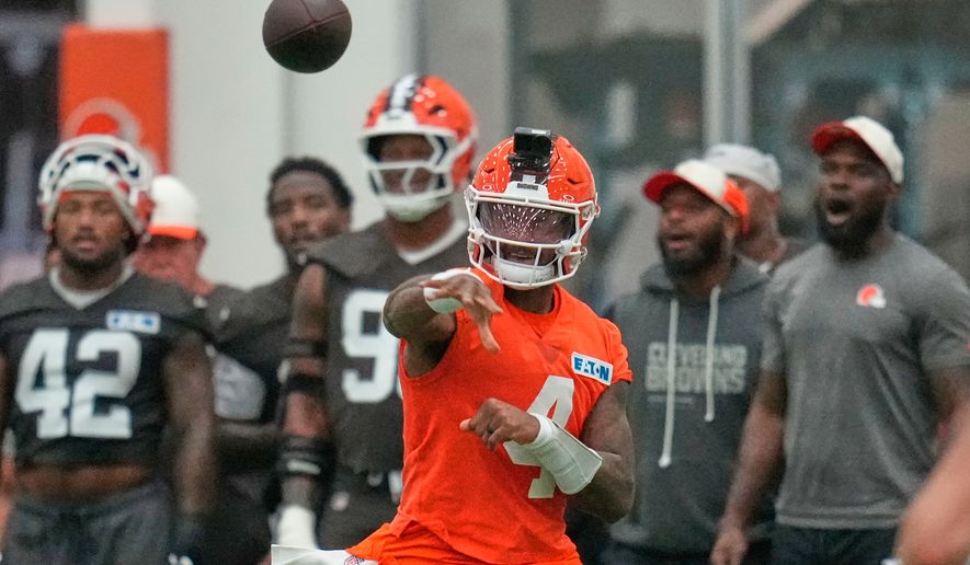 Cleveland Browns quarterback Deshaun Watson passes during the team's NFL football training camp, Monday, Aug. 10, 2026, in Berea, Ohio. (AP Photo/Sue Ogrocki)