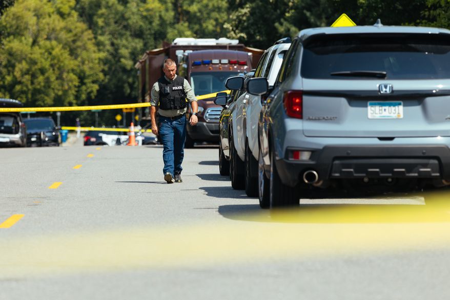 Law enforcement respond to a call at a home daycare, Wednesday, Aug. 12, 2026, in Hopkins, Minn. (AP Photo/Carly Danek)