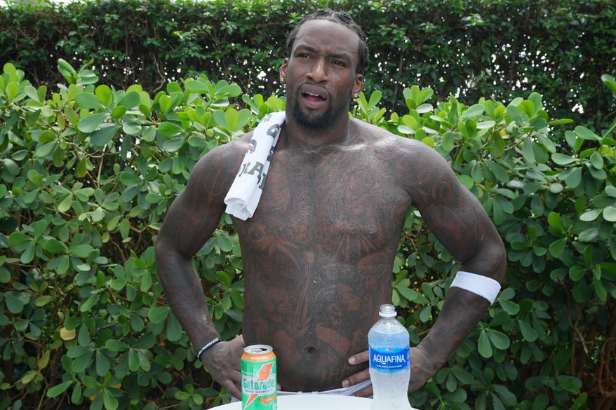 Miami Dolphins defensive line Kahlil Saunders speaks after the team's NFL football training camp, Monday, Aug. 3, 2026, in Miami Gardens, Fla. (AP Photo/Marta Lavandier)