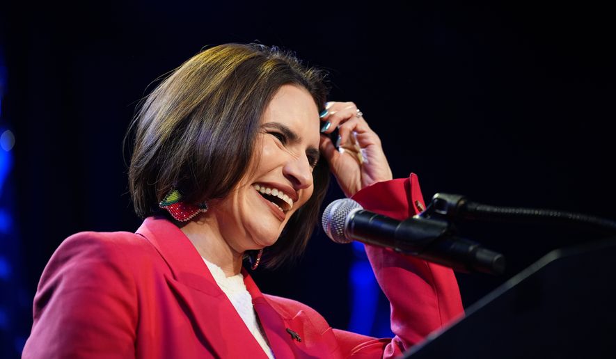 Minnesota Lt. Gov. Peggy Flanagan, a Democratic candidate for U.S. Senate, smiles on stage during an election night watch party on Tuesday, Aug. 11, 2026, in Minneapolis. (AP Photo/Ellen Schmidt)