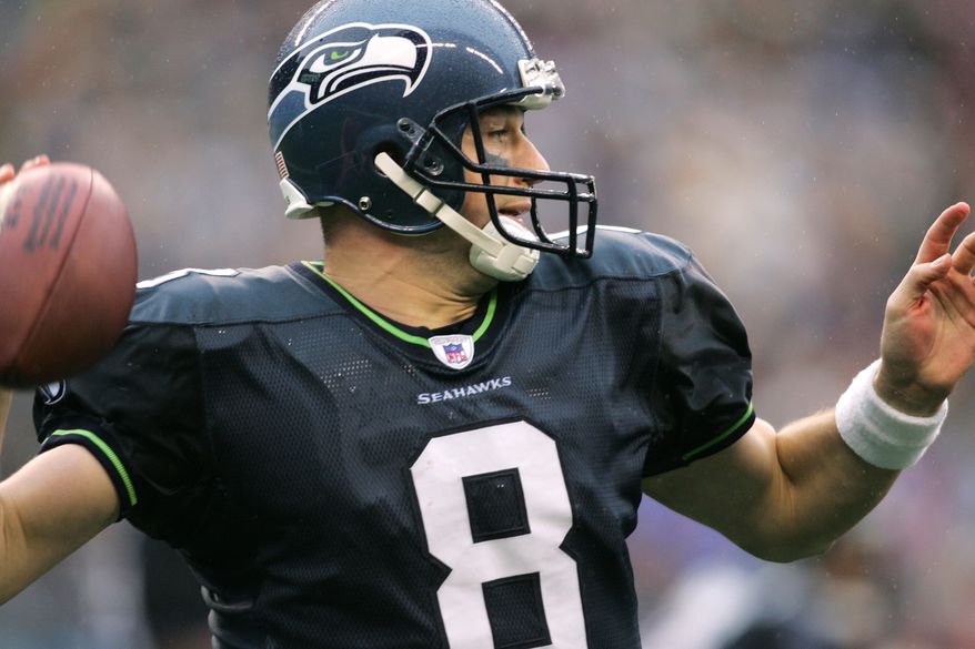 FILE - Seattle Seahawks quarterback Matt Hasselbeck passes during the fourth quarter against the Dallas Cowboys in Seattle, Oct. 23, 2005. (AP Photo/John Froschauer, File)