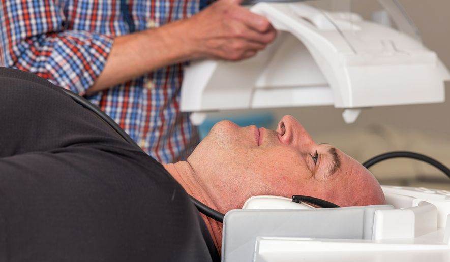 Former NFL quarterback Matt Hasselbeck prepares to have an MRI during medical tests on July 28, 2026, at Boston University in Boston. (Boston University via AP)