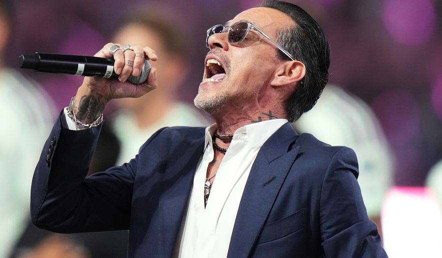 Marc Anthony performs the national anthem before an MLS soccer match between Inter Miami CF and Austin FC in Miami, April 4, 2026. (AP Photo/Lynne Sladky, File)