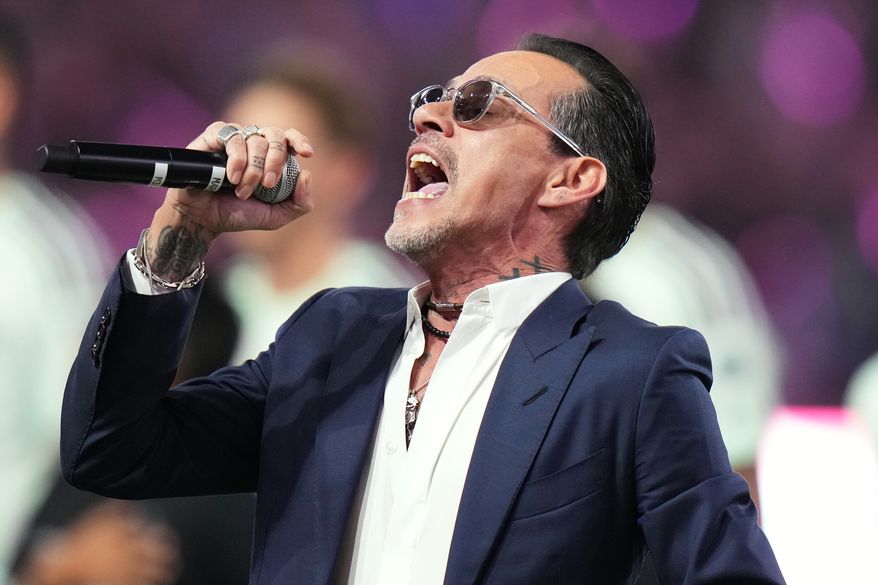 Marc Anthony performs the national anthem before an MLS soccer match between Inter Miami CF and Austin FC in Miami, April 4, 2026. (AP Photo/Lynne Sladky, File)